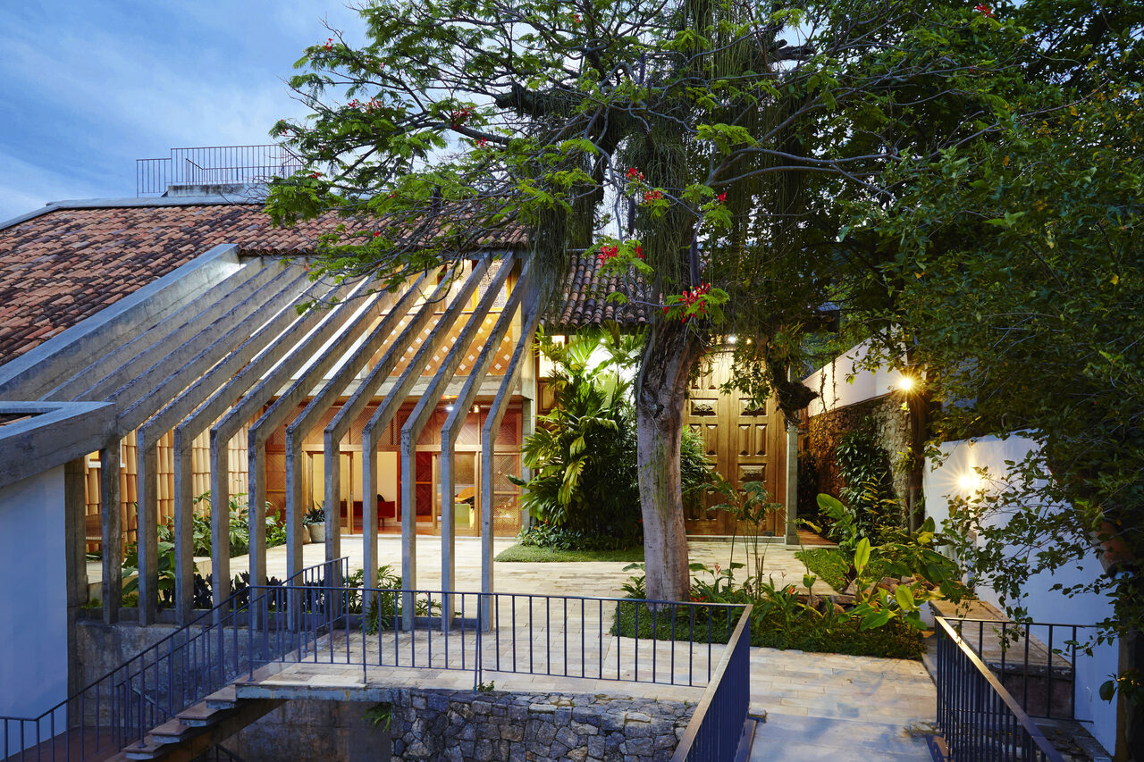 Entrance courtyard beneath the flowering tree